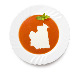 Plate tomato soup with cream in the shape of Mauritania.(series)