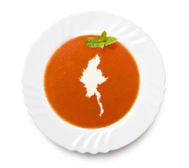 Plate tomato soup with cream in the shape of Burma.(series)