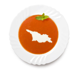 Plate tomato soup with cream in the shape of Georgia.(series)