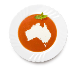 Plate tomato soup with cream in the shape of Australia.(series)