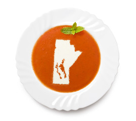 Plate tomato soup with cream in the shape of Manitoba.(series)