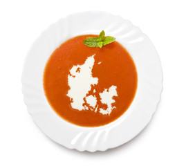 Plate tomato soup with cream in the shape of Denmark.(series)