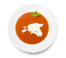 Plate tomato soup with cream in the shape of Estonia.(series)