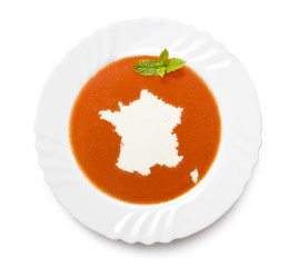 Plate tomato soup with cream in the shape of France.(series)