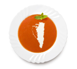 Plate tomato soup with cream in the shape of Gibraltar.(series)