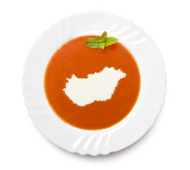 Plate tomato soup with cream in the shape of Hungary.(series)
