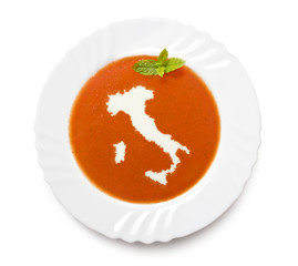 Plate tomato soup with cream in the shape of Italy.(series)