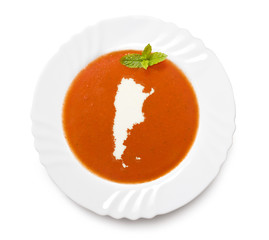 Plate tomato soup with cream in the shape of Argentina.(series)