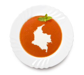 Plate tomato soup with cream in the shape of Colombia.(series)