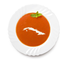 Plate tomato soup with cream in the shape of Cuba.(series)
