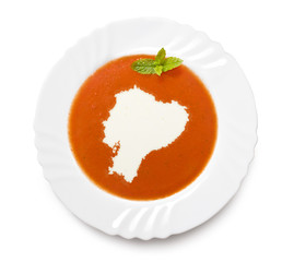 Plate tomato soup with cream in the shape of Ecuador.(series)