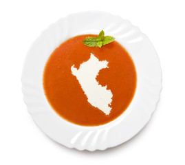 Plate tomato soup with cream in the shape of Peru.(series)