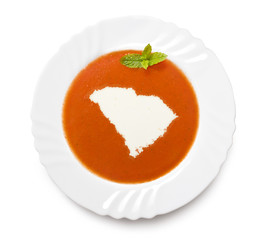 Plate tomato soup with cream in the shape of South Carolina.(ser