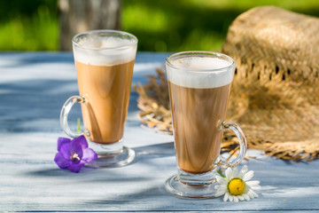 Coffee latte served in a sunny day