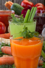Healthy vegetable juices of carrot, celery, beetroot and tomato
