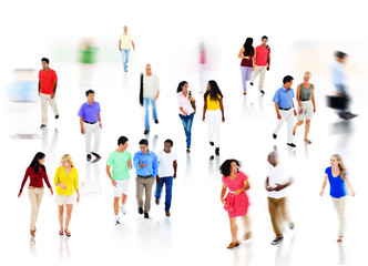 Fototapeta premium Multi-Ethnic Group of People Walking in Blurred Motion