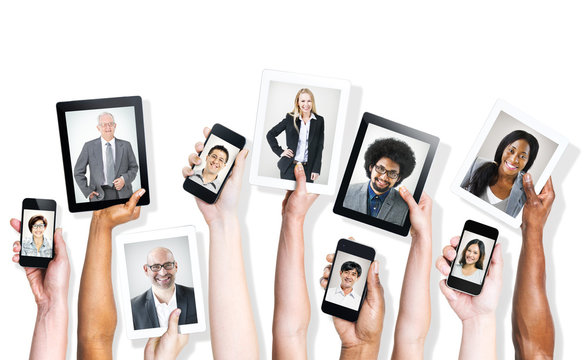 Hands Holding Digital Devices with Business People's Images