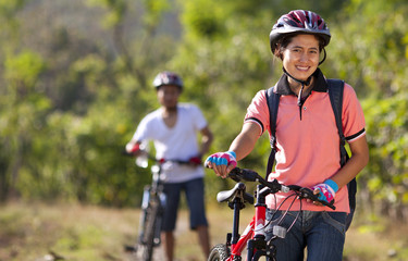 Beautiful asian girl riding bike