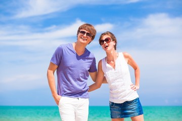 front view of couple having fun at beach