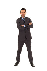 young latin man standing wearing grey suit