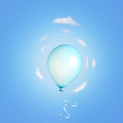 Blue balloon flying