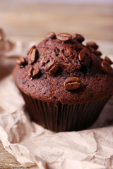Chocolate muffin and coffee grains