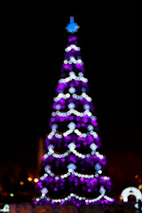 Fototapeta na wymiar Blurred christmas tree lights