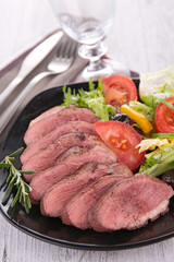 duck breast and vegetables