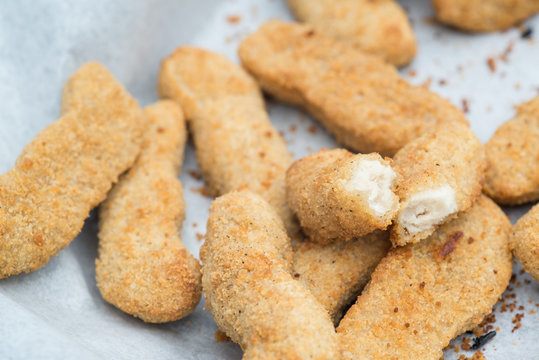 Hot cooked chicken goujon in breadcrumbs for lunch