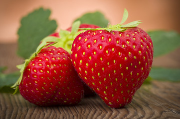 Fresh Strawberry close up on the wood