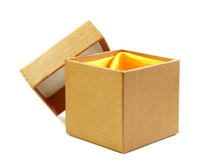 Gold box and lid line with yellow cloth