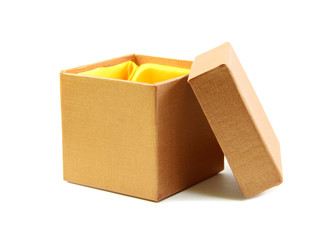 Gold box and lid line with yellow cloth