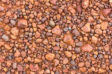 abstract background with red stones on the ground