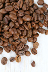 coffee beans on wooden surface
