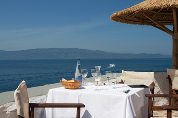 Table with glassware at outdoor restaurant