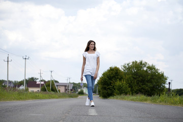 Young woman walking outdoor