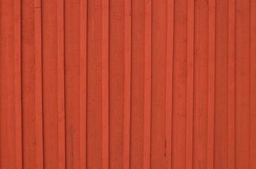 Naklejka premium Red wooden fence background