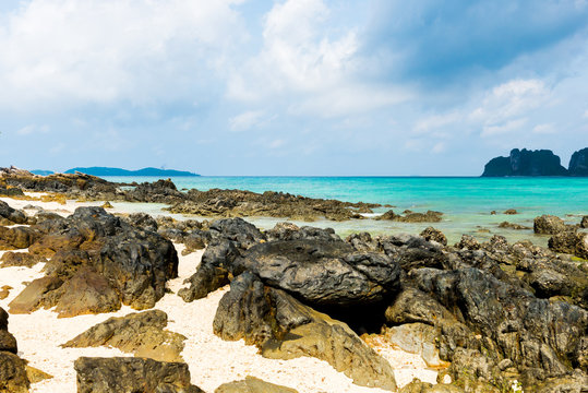 Rocks on the beach in Tropical sea at Bamboo Island Krabi Provin © sirastock