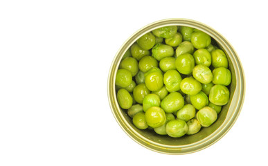 Green peas in a tin can over white background