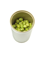 Green peas in a tin can over white background