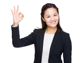 Asian business woman with ok sign