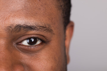 handsome man looking straight into camera.