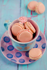 Vanilla macaroon in colorful cup
