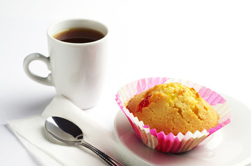 Delicious cupcake and coffee