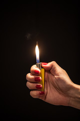 Hand and a lighter 