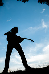 guitarist playing outdoors