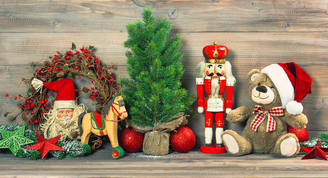 christmas decoration with antique toys teddy bear