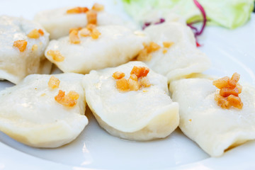 delicious dumplings boiled in white plate