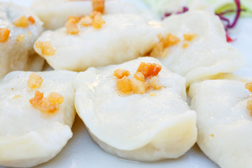 delicious dumplings boiled in white plate