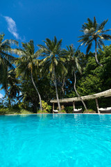 Perfect tropical island paradise beach and pool